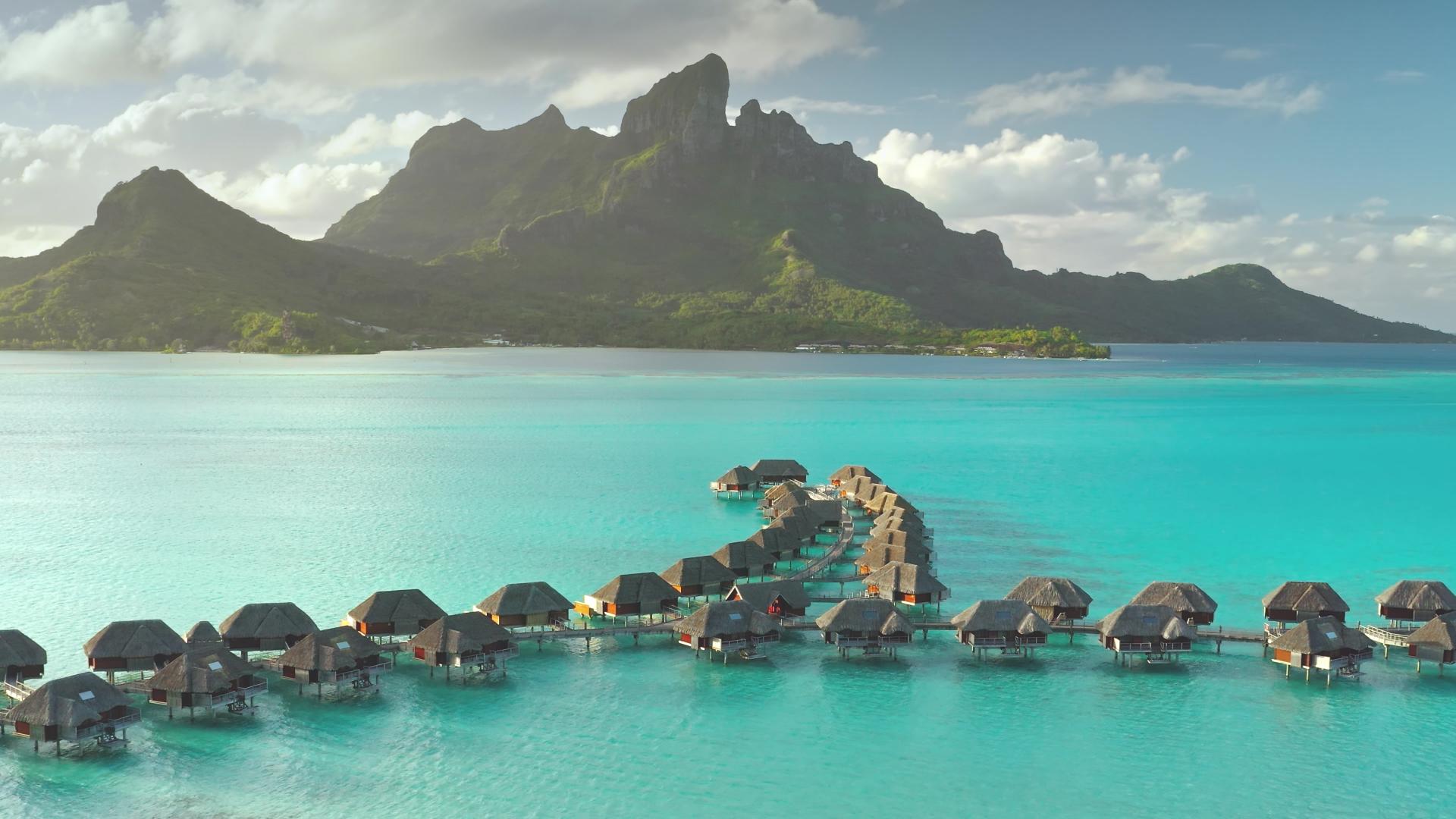 Overwater bungalows at the Four Seasons Bora Bora in French Polynesia.