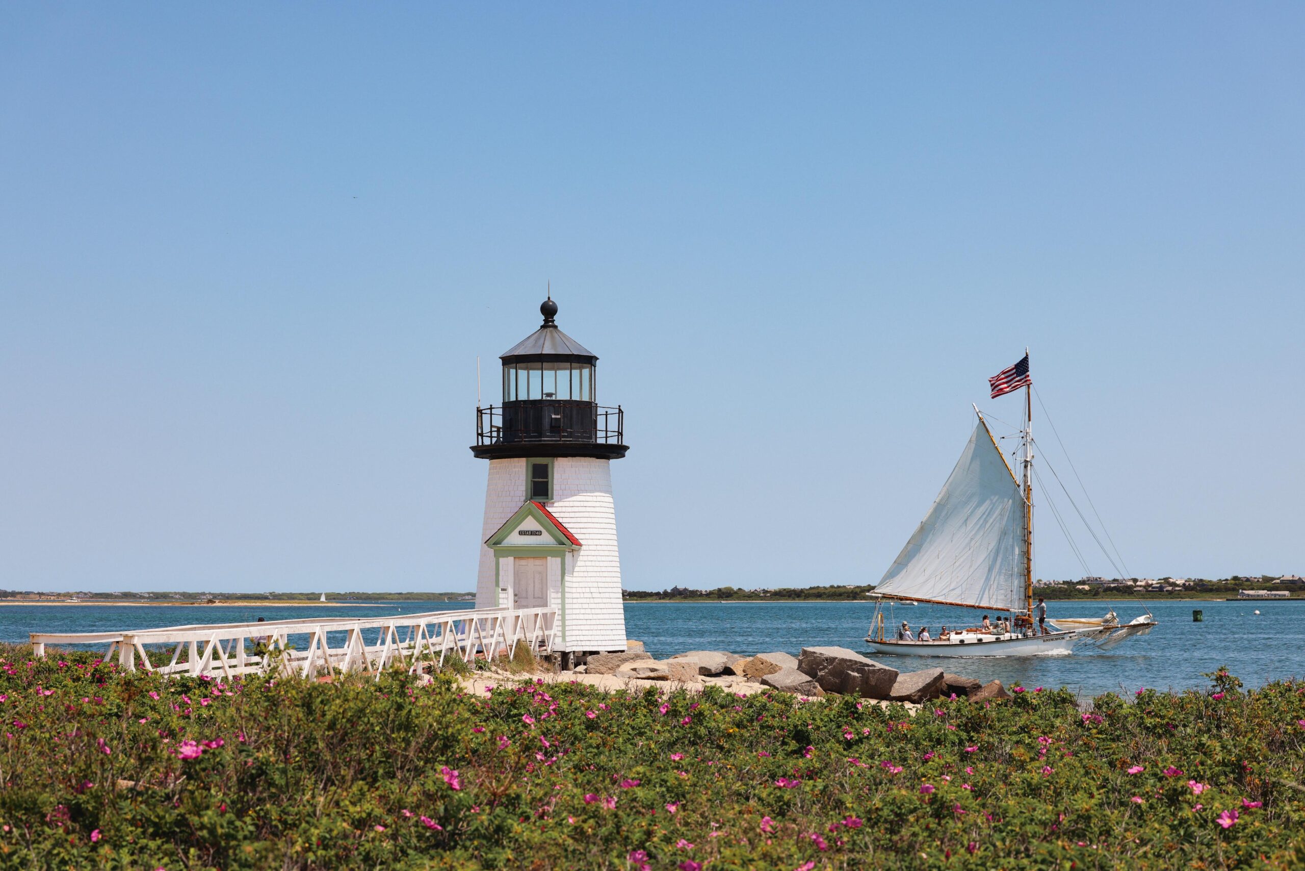 The iconic Brant Point Lighthouse welcomes travelers to Nantucket.